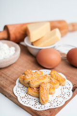 Kastengel or Dutch version of kaasstengels is Indonesian cheese sticks or cheese cookies. its popular cookies that Indonesian household will have.Snacks for Ramadhan iftar, Eid Fitr Mubarak, Islamic