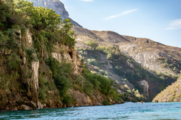 A green mountain river. Water landscape.