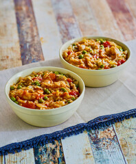 shrimp jambalaya served in white bowls