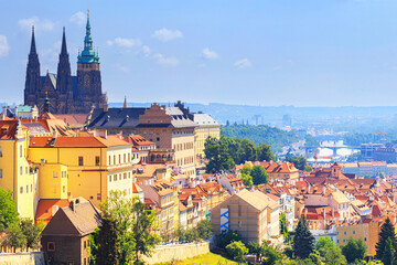 Summer cityscape - view of the Hradcany historical district of Prague and castle complex Prague...