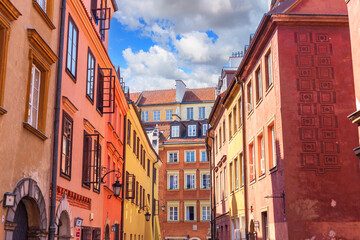 Obraz premium Cityscape - view of narrow streets with colorful old houses in the Old Town of Warsaw, Poland