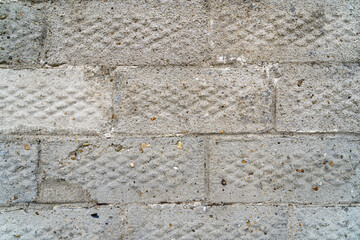 Old brick fence with a pattern - texture.