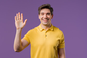 Naklejka premium Friendly mature american Young Man Waving Hand - Hello, Hi, Salute. Greetings.