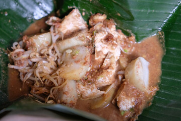 Ketoprak is a traditional food from Jakarta, Indonesia, consisting of tofu, rhombus, bean sprout, cucumber, and rice vermicelli served with peanut sauce.