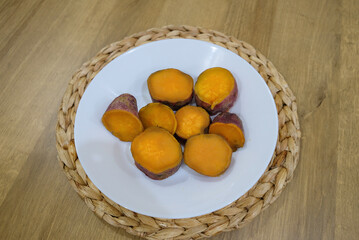 Steamed sweet potato in a plate.