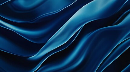 Obraz premium A close-up of flowing blue fabric, showcasing smooth waves and texture.