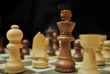 Close up picture of Chess Pieces with King In focus