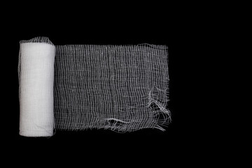 Sterile White Medical Rolled Gauze  Close up Isolated on black Background