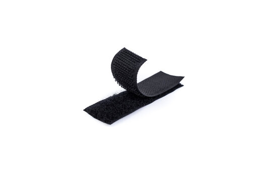 Fastener Velcro tape isolated on white, soft focus close up