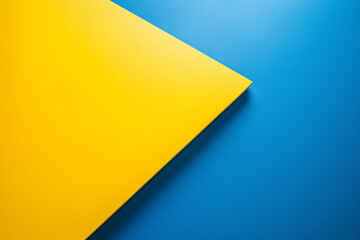 yellow and blue paper with a triangle on it. The yellow and blue colors create a sense of contrast and harmony