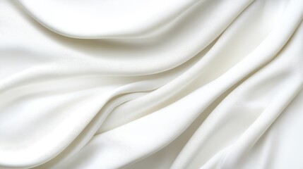 Obraz premium A smooth, flowing white fabric creating an elegant and soft texture.
