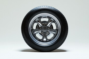 Obraz premium a close up of a car tire and wheel on a white background