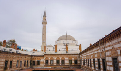 Fototapeta premium Hisar Mosque in Kizlaragasi Inn (Kızlar Agasi Hani) in Izmır, Turkey. Famous historical mosque near Konak Square. 
