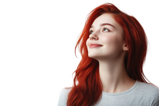 Vibrant young woman with a relaxed hairstyle, lightly tilting her head to the side, expressing happiness.