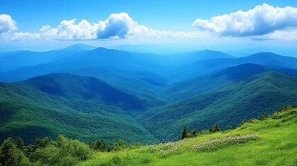 Naklejka premium Serene Mountain Range Under Blue Sky With Fluffy Clouds