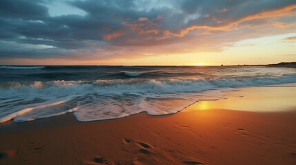 Fototapeta premium A photo of a beach sunset with smooth sandy shores