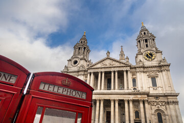 Two red telephone boxes in front of St. Paul's Cathedral