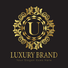 Letter Luxury brand logo design with a royal gold crown emblem and elegant typography
