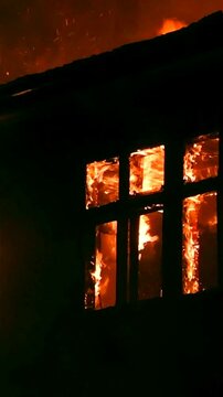 A forest fire destroys a house. The tragedy resulted from a fire in an apartment building.