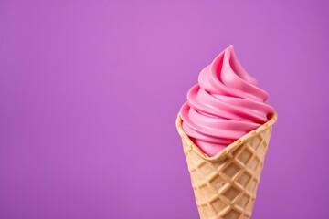 High-resolution stock photo  A heart-shaped ice cream cone with vibrant pink gelato on a bright purple background. 