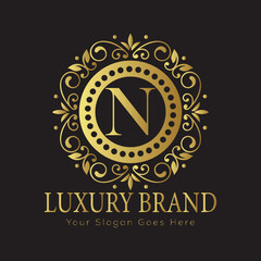 Fototapeta premium Letter Luxury brand logo design with a royal gold crown emblem and elegant typography 