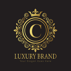 Letter Luxury brand logo design with a royal gold crown emblem and elegant typography

