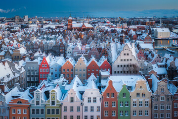 Beautiful tenement houses of Gdansk covered with fresh snow, Poland © Patryk Kosmider
