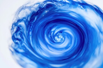 Close-up view of a blue swirl pattern on a white surface