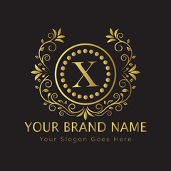 Letter Luxury brand logo design with a royal gold crown emblem and elegant typography
