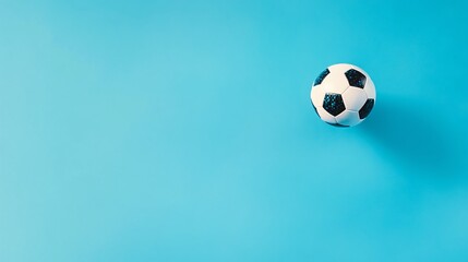Fototapeta premium Soccer Ball on Blue Background