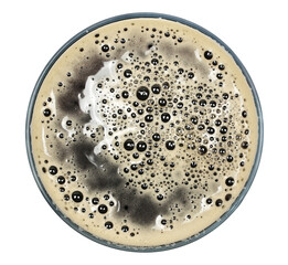 Glass of dark stout beer with foam, isolated on white, top view, clipping path