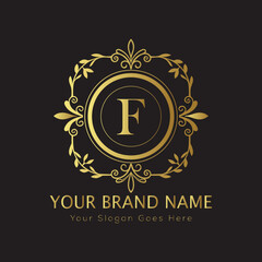 Letter Luxury brand logo design with a royal gold crown emblem and elegant typography
