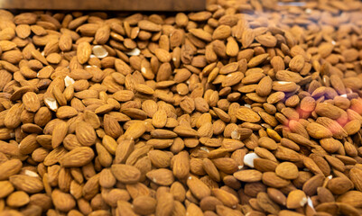 close up, top view many dried almonds. Healthy snack
