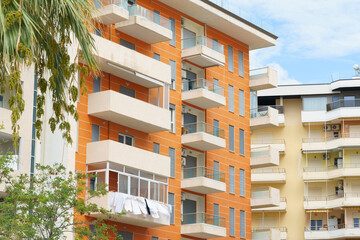 Obraz premium Modern apartment building in Mediterranean style in Albania on the sea coast. Concept of selling a house abroad, renting apartments