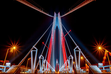 Yavuz Sultan Selim Bridge Istanbul, Turkiye. Stunning Night View of a Modern Cable-Stayed Bridge Under Construction.A captivating low-angle shot of a modern cable-stayed bridge at night.