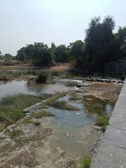 A old water Flowing  at Village Dam.