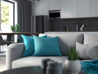Modern living room interior with grey sofa, teal cushions, and kitchen in background.