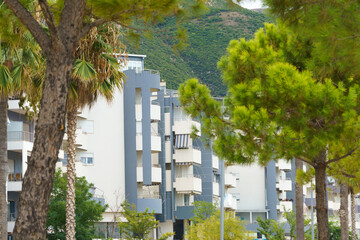 Modern apartment building in Mediterranean style in Albania on the sea coast. Concept of selling a house abroad, renting apartments