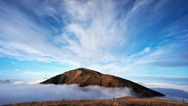 misty clouds flow like a sea in the mountains