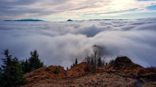 misty clouds flow like a sea in the mountains