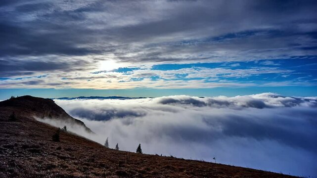 misty clouds flow like a sea in the mountains
