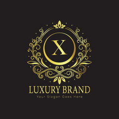 Letter Luxury brand logo design with a royal gold crown emblem and elegant typography
