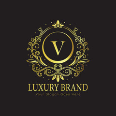 Letter Luxury brand logo design with a royal gold crown emblem and elegant typography
