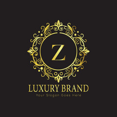 Letter Luxury brand logo design with a royal gold crown emblem and elegant typography
