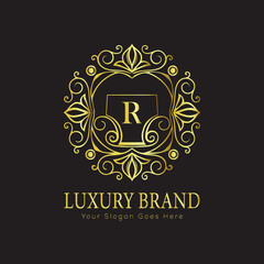 Letter Luxury brand logo design with a royal gold crown emblem and elegant typography
