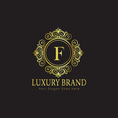 Letter Luxury brand logo design with a royal gold crown emblem and elegant typography
