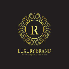 Letter Luxury brand logo design with a royal gold crown emblem and elegant typography
