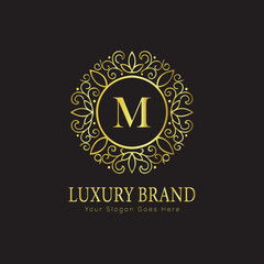 Letter Luxury brand logo design with a royal gold crown emblem and elegant typography
