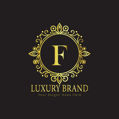 Letter Luxury brand logo design with a royal gold crown emblem and elegant typography
