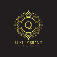 Letter Luxury brand logo design with a royal gold crown emblem and elegant typography
